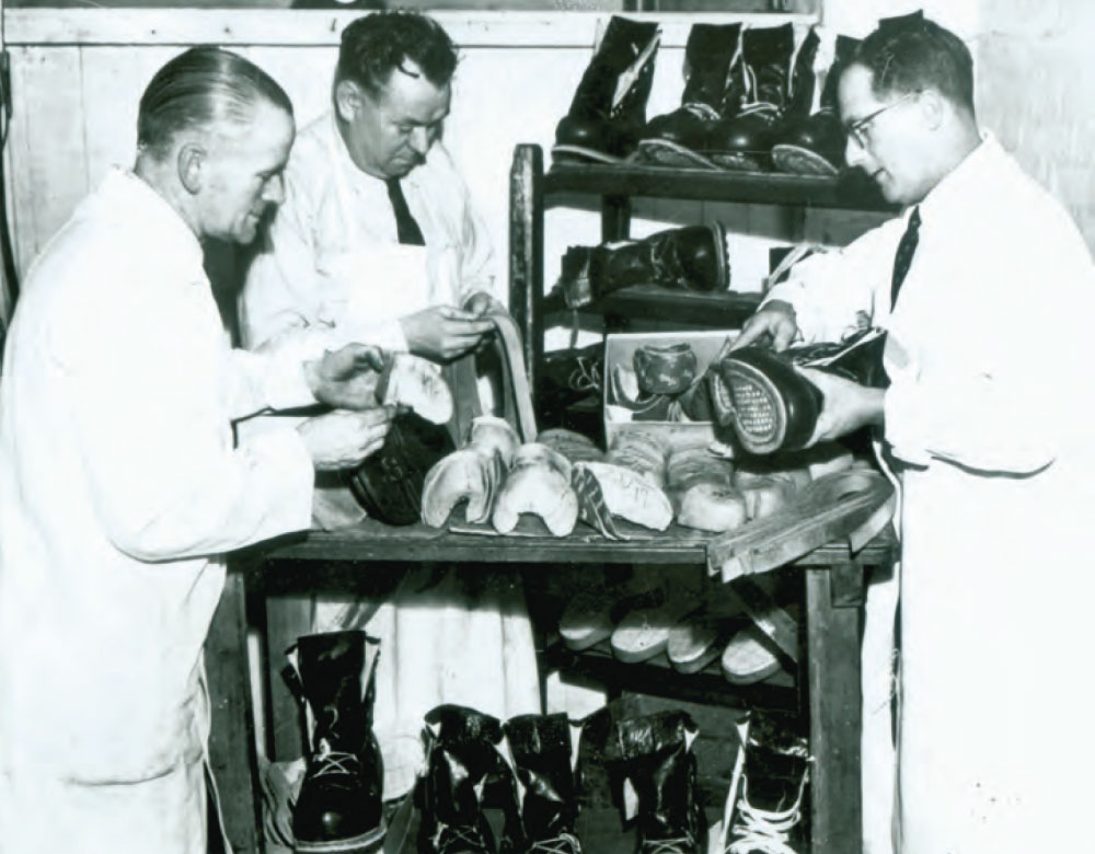 SATRA's head of shoemaking, Ron Skillman(right), with two colleagues making up the British Everest Expedition's boots